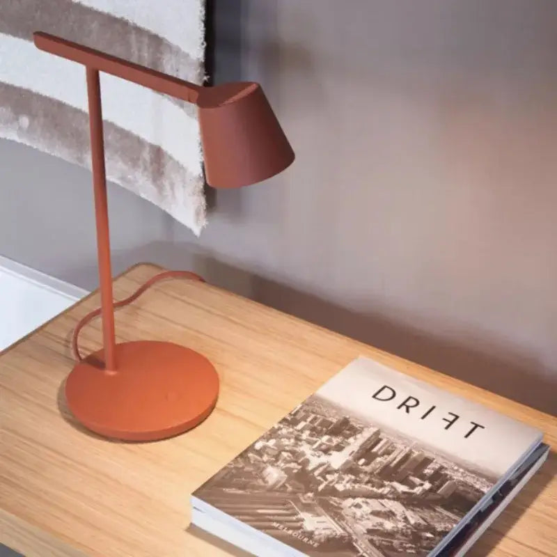 Minimalist terracotta dimmable desk light with matte finish and sleek modern design ideal as a decorbites table lamp