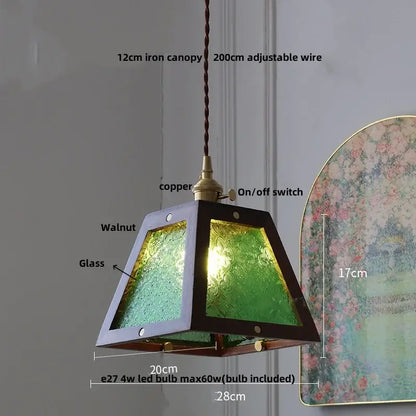 Minimalist dark walnut and brass glass led pendant lamp with textured green panels and copper suspension for dining room