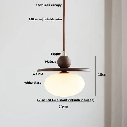 Minimalist walnut and brass glass led pendant lamp with warm white globe and adjustable wire for dining room lighting