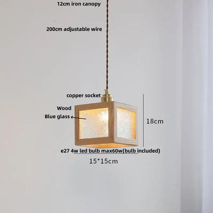 Minimalist walnut and brass glass led pendant lamp with blue textured glass panels and copper socket for dining room