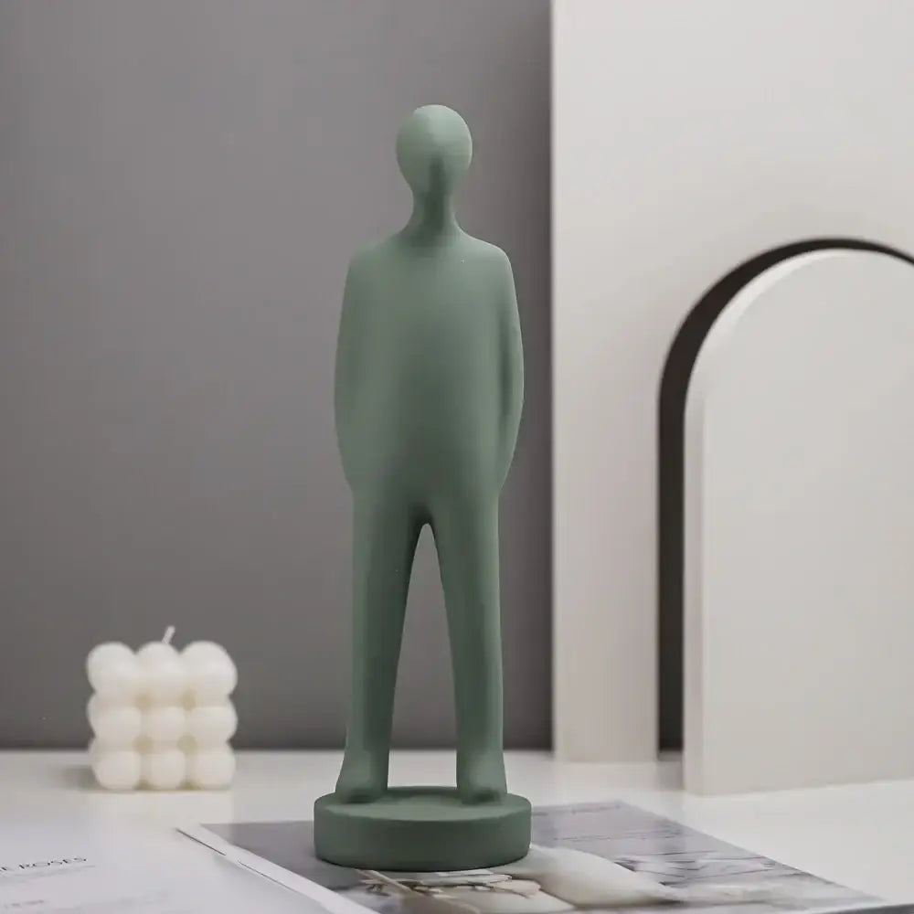 Minimalist sage green ceramic people resin statue with smooth abstract features for decorbites abstract people decor