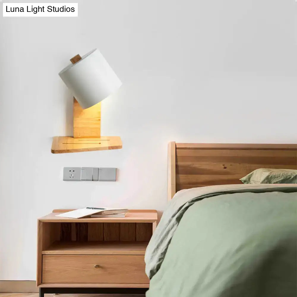 Minimalist white and green nordic wooden wall sconce with cylindrical white shade and natural wood base for bedroom light