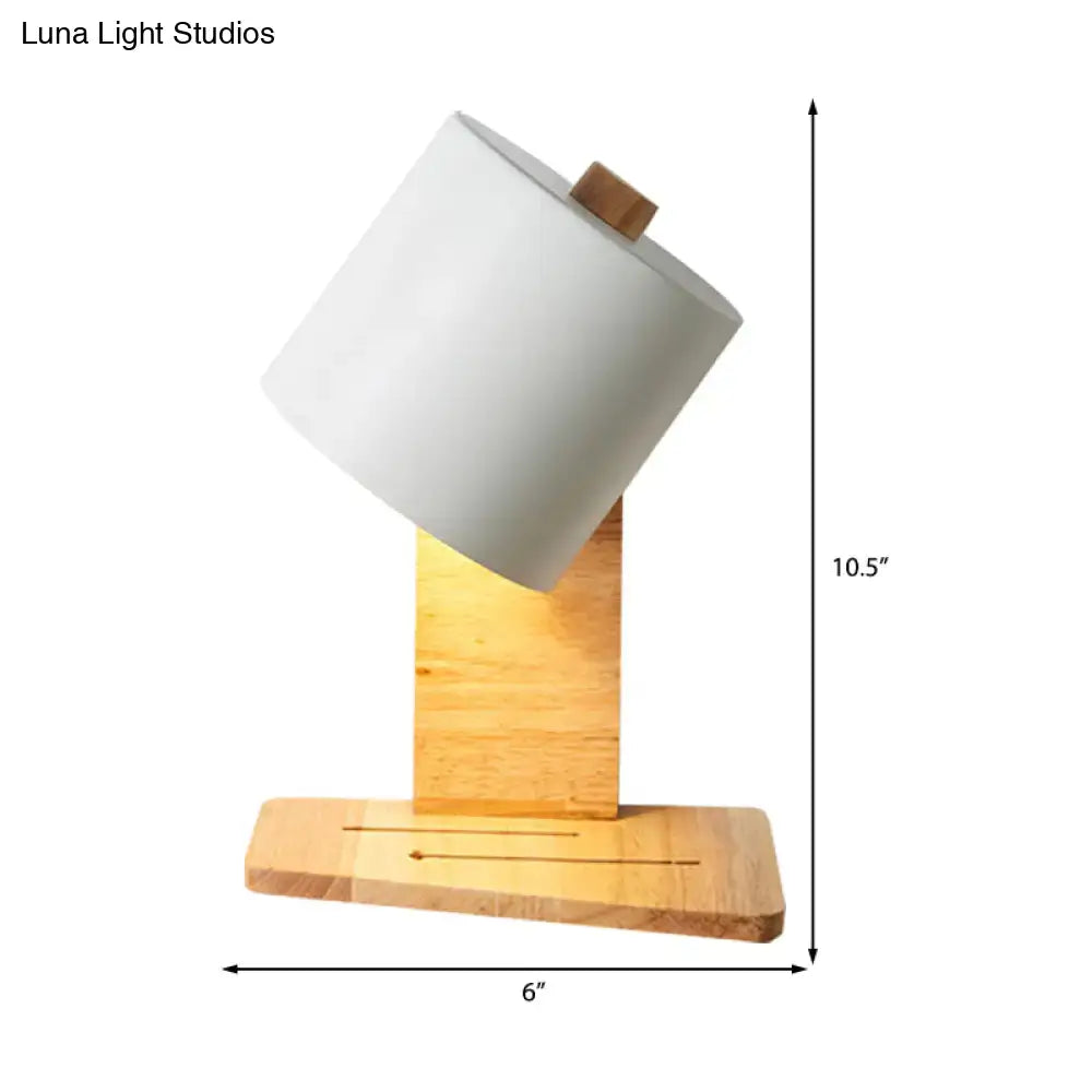 Minimalist white green nordic wood wall sconce with a white ceramic cylindrical lamp and wooden base for bedroom lighting