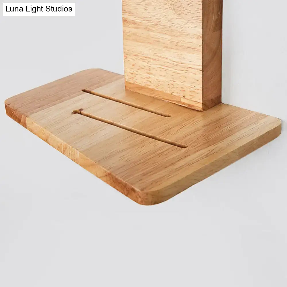 Light brown wooden wall-mounted shelf with vertical support and two slots for minimalist white green nordic decor