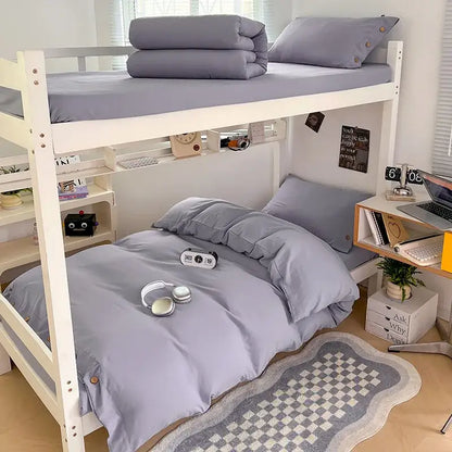 Gray bunk bed with a minimalist white buttoned washed cotton bedding set by decorbites for modern bedroom decor