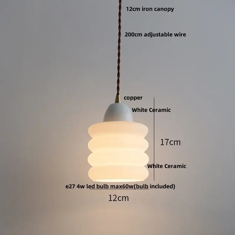 Minimalist white ceramic led pendant lamp with stacked tiers and copper canopy for warm dining room glow pendant lamp