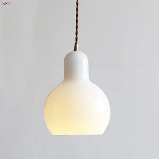 Minimalist white ceramic led pendant lamp with warm glow and twisted brown cord ideal for dining room lighting