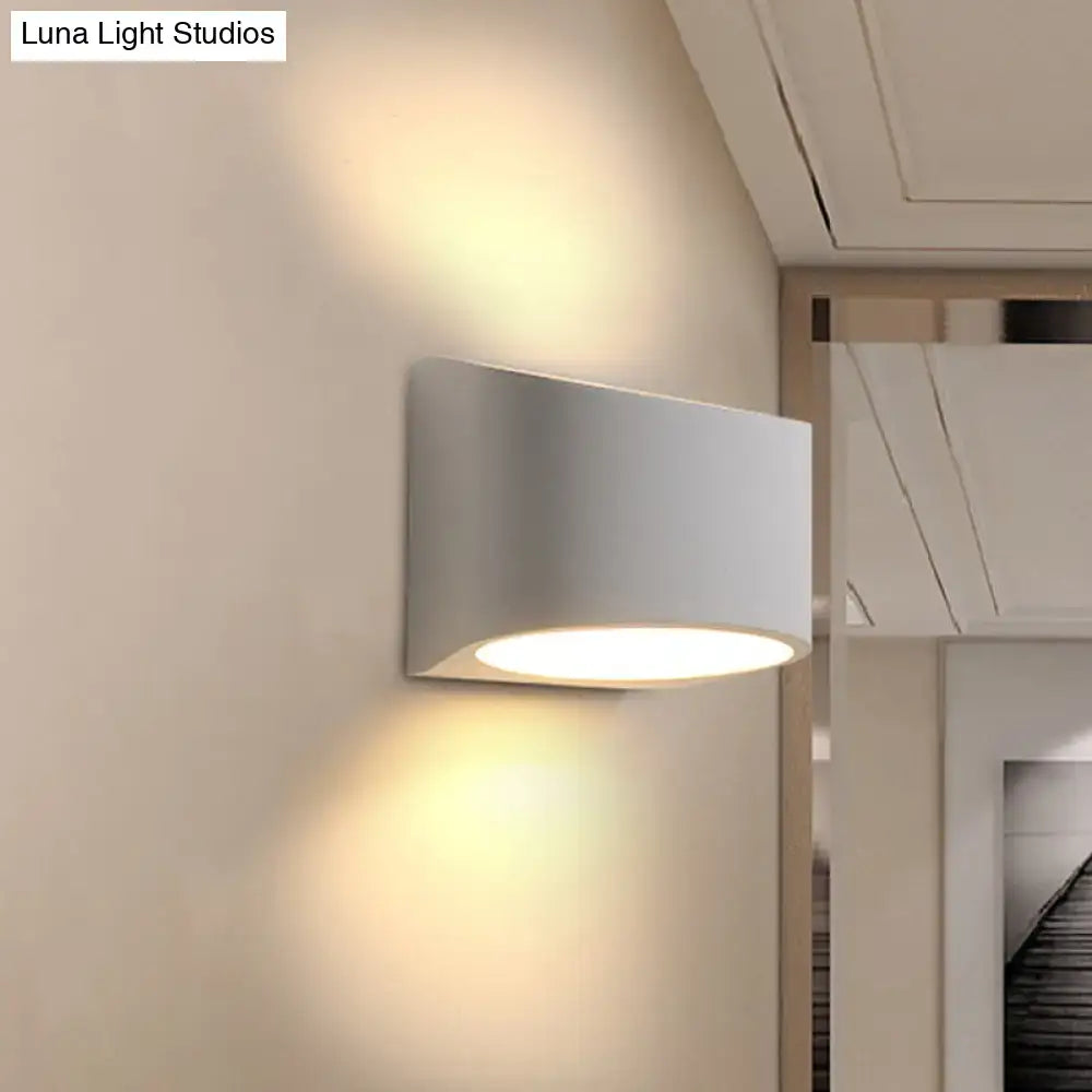 Minimalist white cylindrical led wall sconce with sleek design and warm ambient lighting for bedroom wall lamp