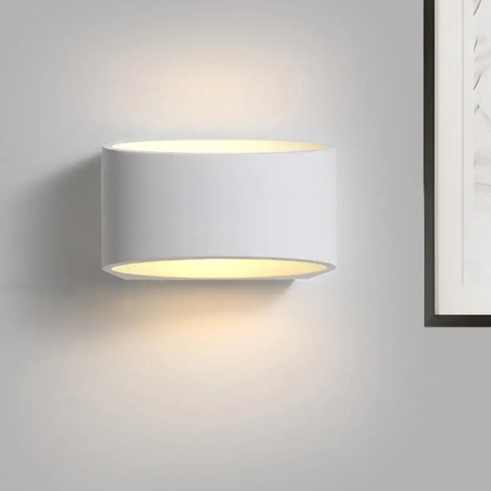 Minimalist white cylindrical led wall sconce wall lamp with warm diffused glow for bedroom lighting
