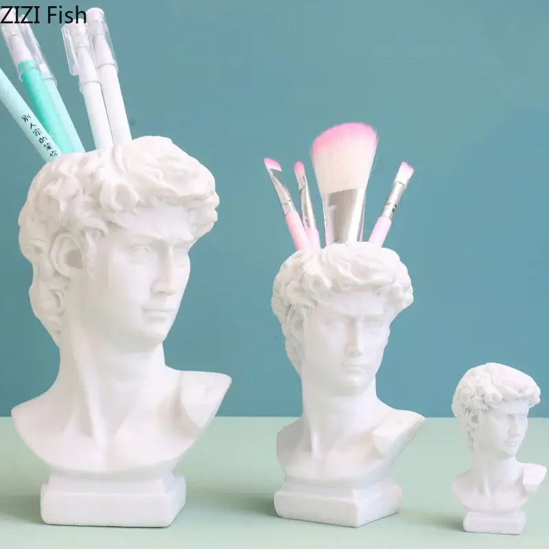 Minimalist white david portrait resin sculpture serving as decorative pen and brush holders for living room decorbites david portrait