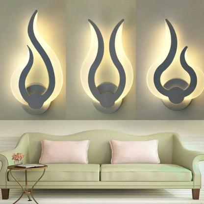Minimalist white flame wall sconces with a sleek gray finish and warm glowing LED light for bedroom use