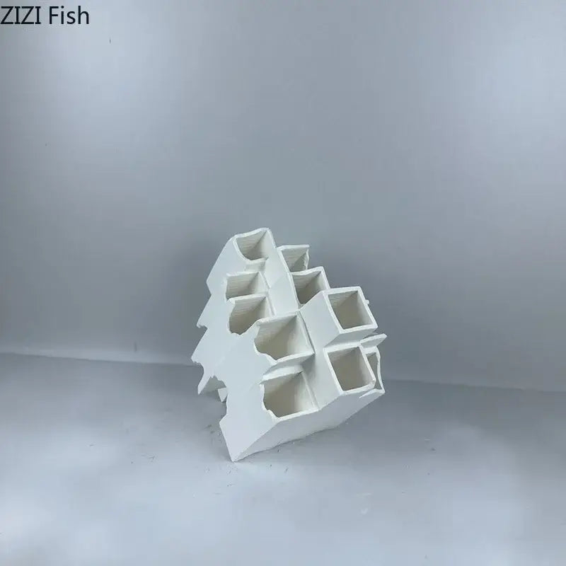 Minimalist white geometric ceramic desk ornament featuring multi-tiered hollow compartments for decorbites geometric ceramic decor