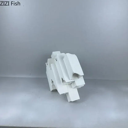 Minimalist white abstract geometric ceramic desk ornament made of molded plastic for modern decorbites geometric ceramic decor