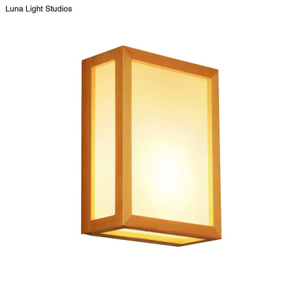 Minimalist wall sconce with warm-toned white glass and wooden frame designed for corridors