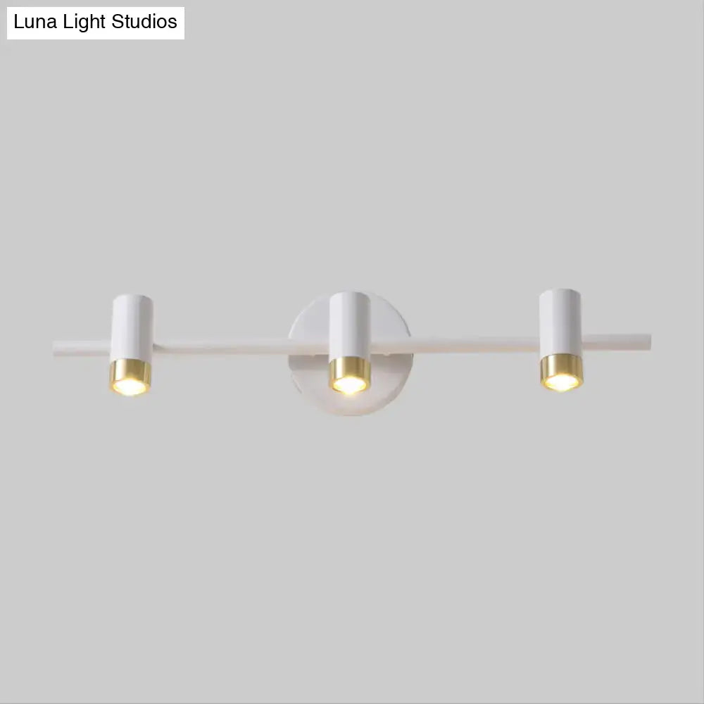 Minimalist white and gold three-arm vanity lamp with cylindrical bulb base modern wall sconce light type