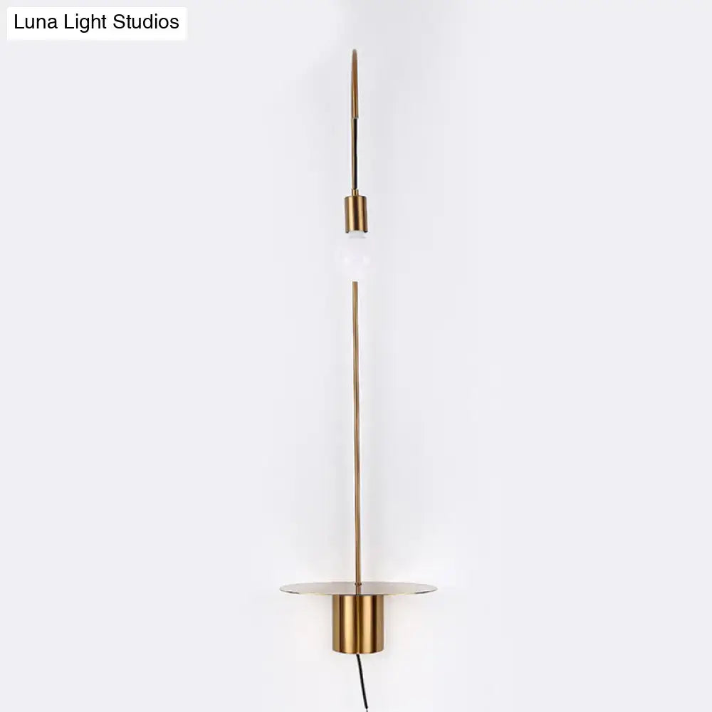 Minimalist white gooseneck wall sconce wall light with slender brass rod and cylindrical gold-toned base for bedroom use