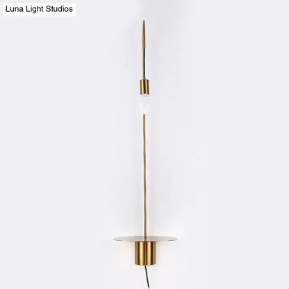 Minimalist white gooseneck wall sconce wall light with slender brass rod and cylindrical gold-toned base for bedroom use