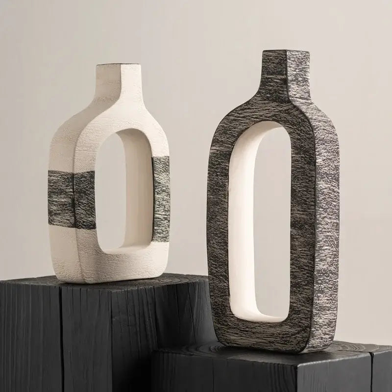 Two modern ceramic flower vases with gray geometric stripes and white interiors for minimalist living room decor