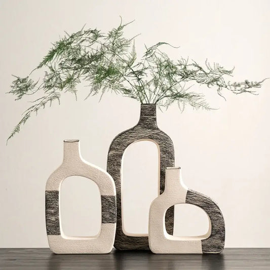 Three modern ceramic flower vases with minimalist white and dark gray geometric stripes for living room decor