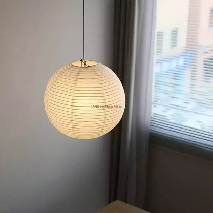 Minimalist white handwoven art pendant lamp with spherical off-white paper lantern and subtle ridges by decorbites handwoven art