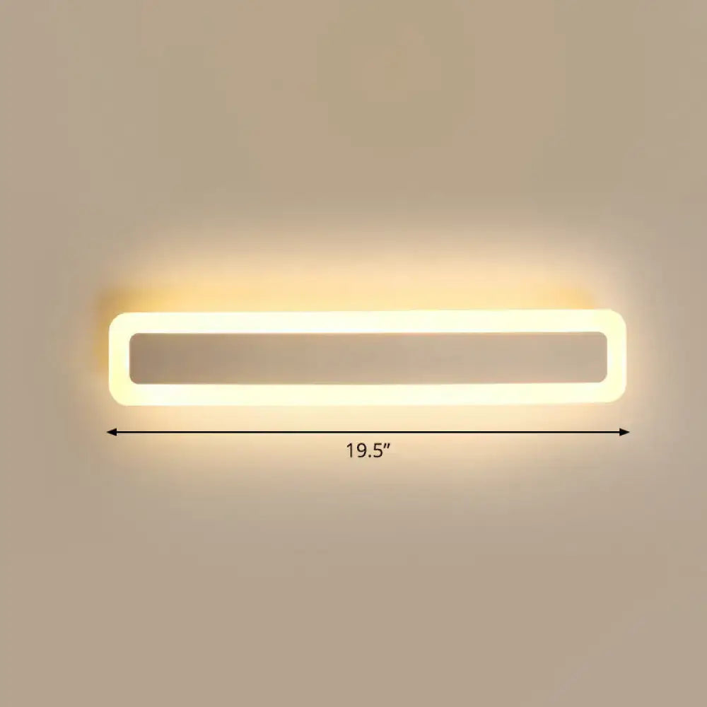 Modern rectangular led wall sconce with a sleek white frame and warm third quality light for vanity light use