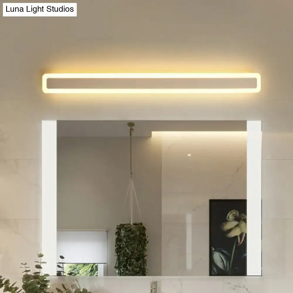 Minimalist white led vanity light bathroom wall sconce with a sleek frame and warm yellow illumination white warm third gear