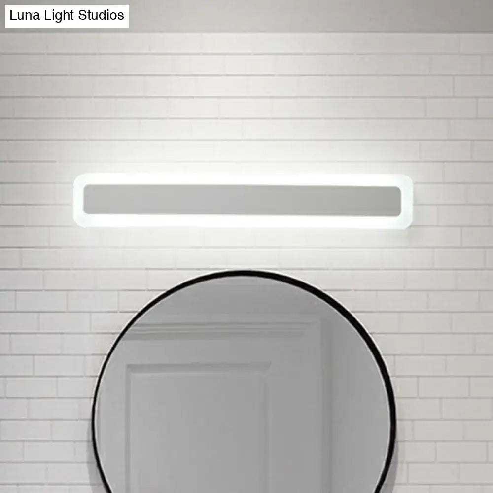 Minimalist white led vanity light with sleek rectangular frame and soft warm third gear illumination for bathroom wall use