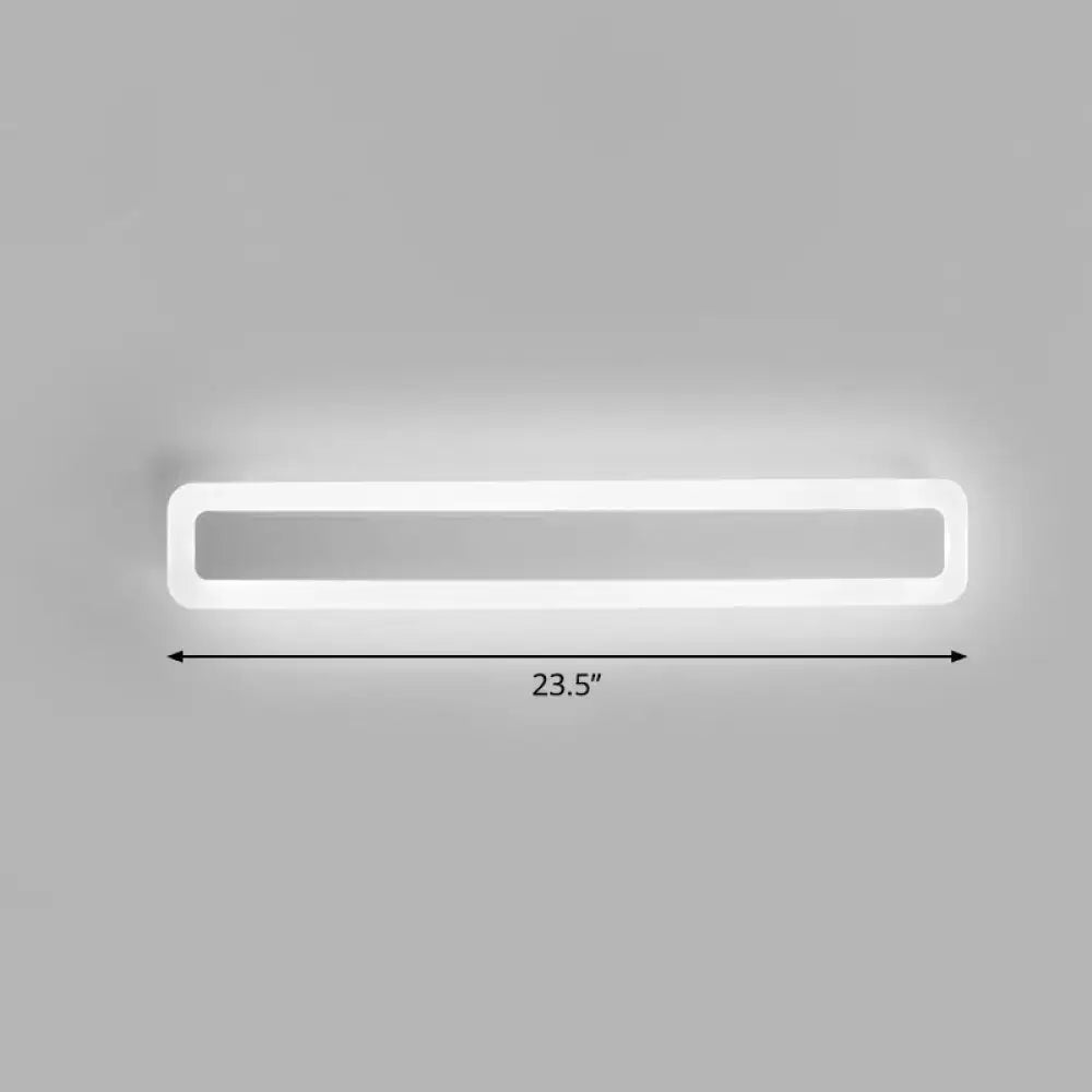 A sleek minimalist white led vanity light bathroom wall sconce with warm third gear and 23.5-inch length