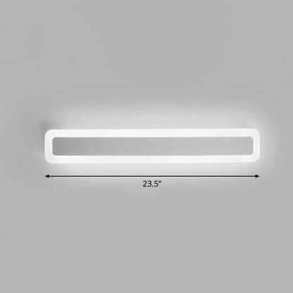 A sleek minimalist white led vanity light bathroom wall sconce with warm third gear and 23.5-inch length