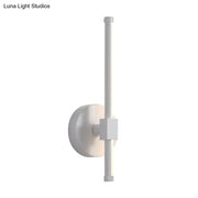 Minimalist white metallic led wall sconce with sleek vertical rod and square accent for bedroom wall mount lighting