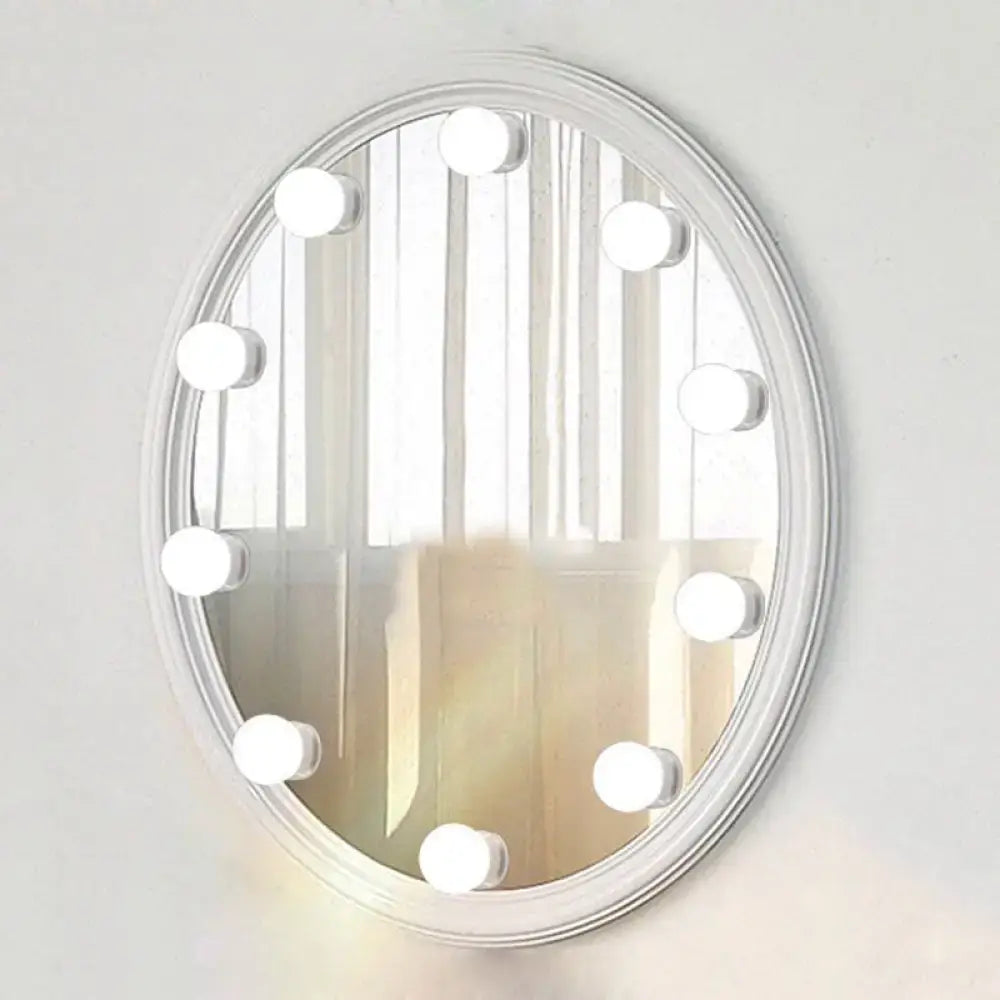 Minimalist white oval led vanity strip mirror with ten circular led lights for dressing room lighting