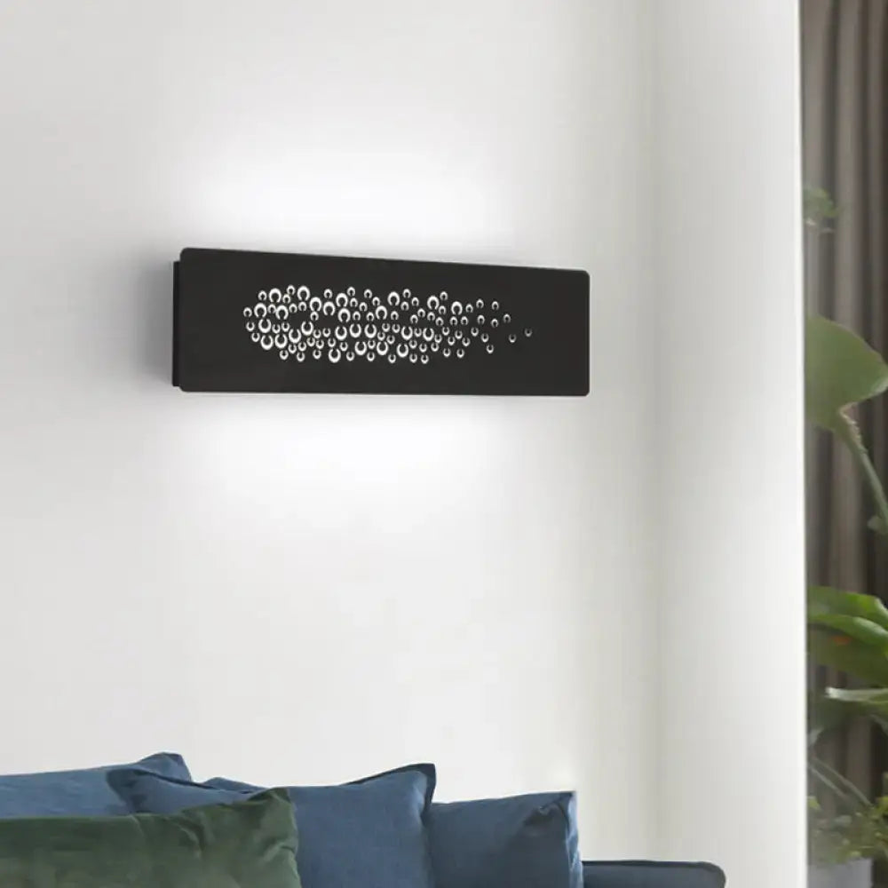 Black rectangular wall lamp with white circular cutouts made of sturdy metal for minimalist bedroom up and down light type