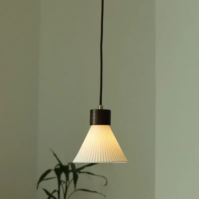 Minimalist white pleated glass pendant light with dark wood finish for dining room home decor by decorbites ceramic led
