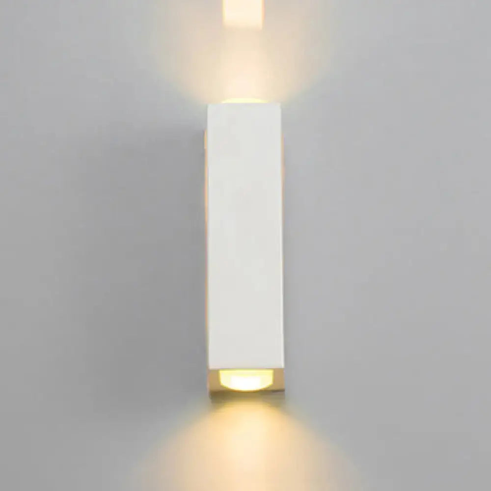 Minimalist white rectangle aluminum wall light with warm dual-directional lighting for bedroom use