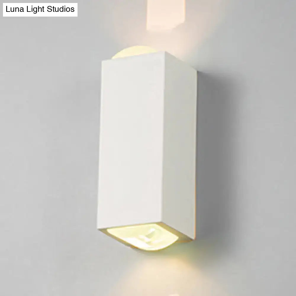 Minimalist white rectangle aluminum wall light with warm soft lighting designed for bedroom use