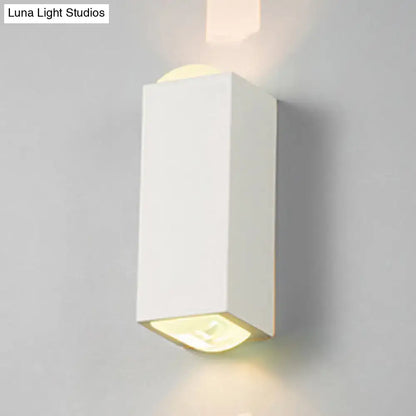 Minimalist white rectangle aluminum wall light with warm soft lighting designed for bedroom use