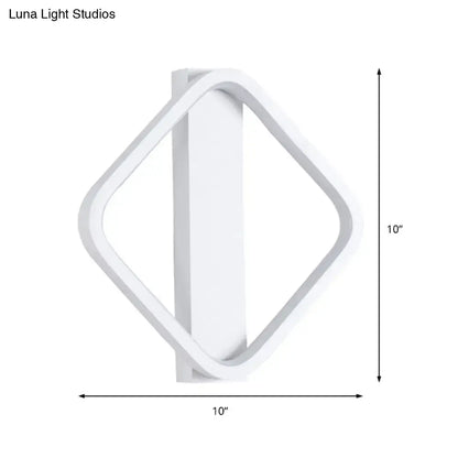 Minimalist white led wall sconce with a round square design and diamond shape for modern bedroom lighting