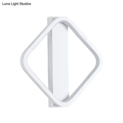 Minimalist white led wall sconce with round square design featuring a diamond-shaped sleek minimalist structure for bedroom lighting