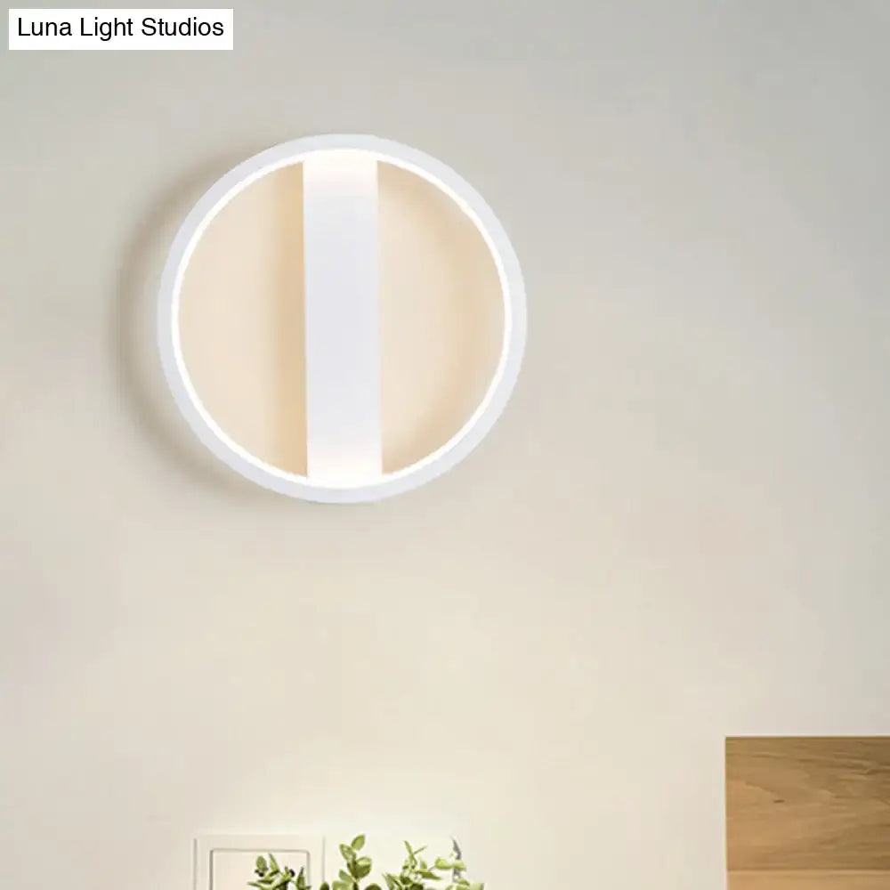Minimalist white round square led wall sconce with a modern circular design and sleek vertical slit for bedroom lighting