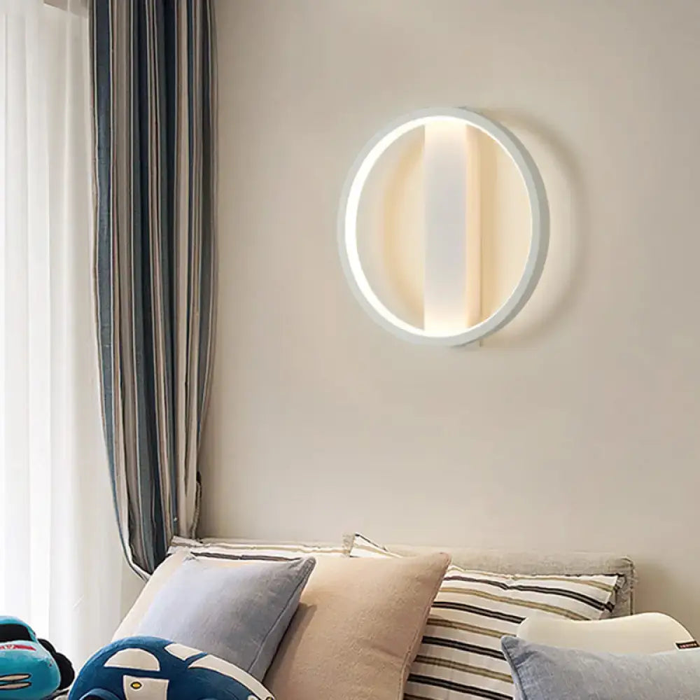 Minimalist white led wall sconce with a modern round square design and warm-toned lighting for bedroom use