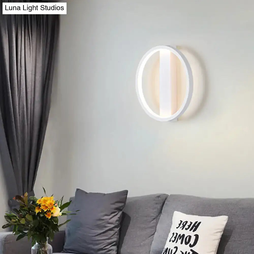 Modern white led wall sconce with a sleek minimalist round square design for bedroom lighting