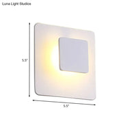Minimalist white square led sconce lighting with white warm light for bedroom featuring soft warm yellow illumination
