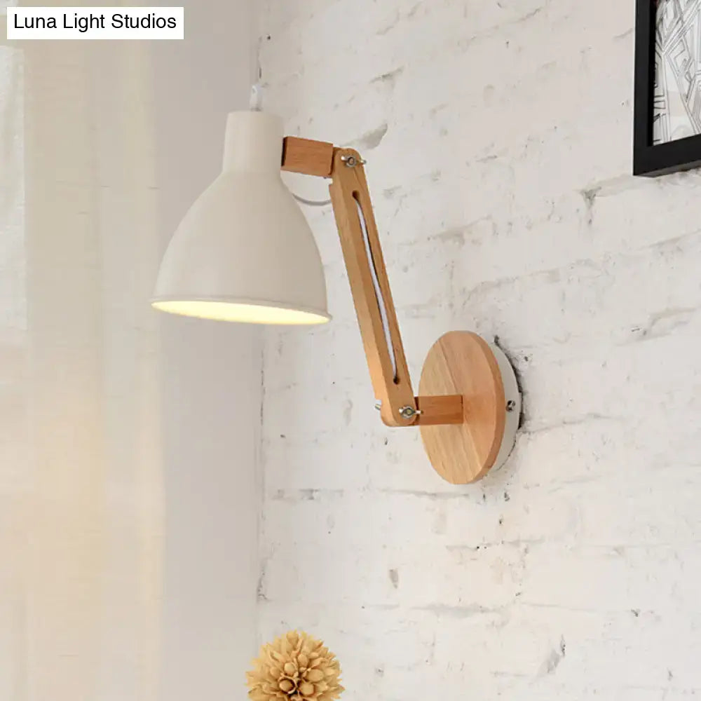 Minimalist white swing arm wall light with ceramic lampshade and light wood articulated arm for bedroom use