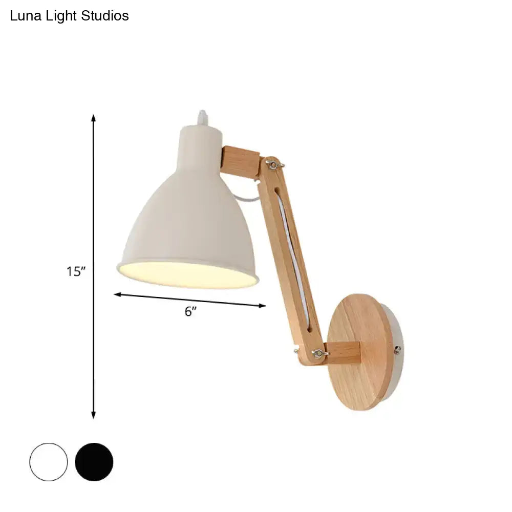 Minimalist white swing arm wall light with matte white shade and light wood-finished articulated arm for bedroom use