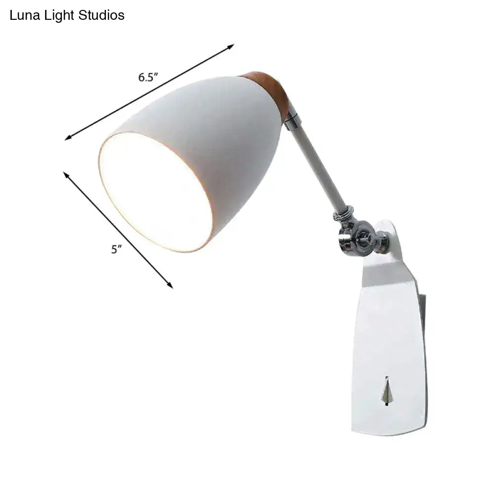 Minimalist white tapered wall light with wood accents on adjustable chrome arm for study desk illumination