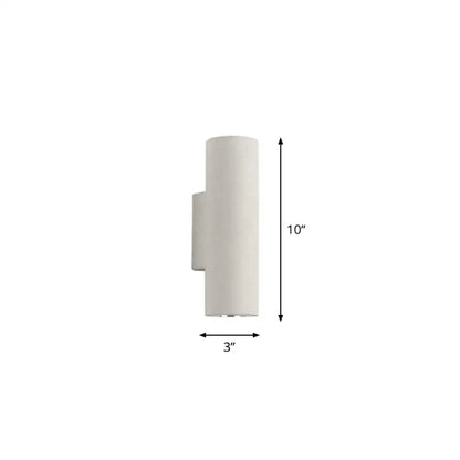 Minimalist white terrazzo stair wall sconce with a sleek cylindrical design and compact fixture height for space efficiency