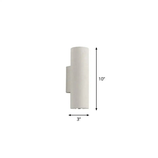 Minimalist white terrazzo stair wall sconce with a sleek cylindrical design and compact fixture height for space efficiency