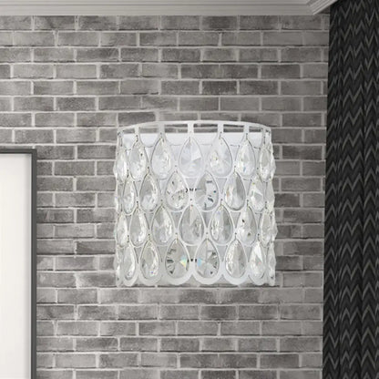 Minimalist white wall lamp featuring clear crystal teardrop pendants for elegant bedroom lighting
