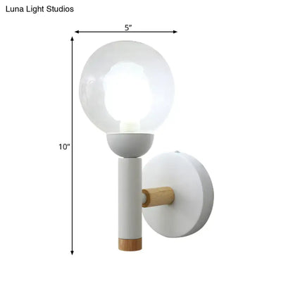Minimalist white and wood armed wall lamp with frosted glass globe and matte stem for 110v-120v bedroom use