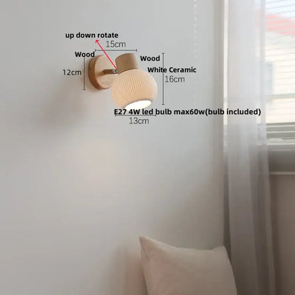 A warm-toned wooden led wall sconce with a ribbed white ceramic shade for minimalist decorbites led wall lighting